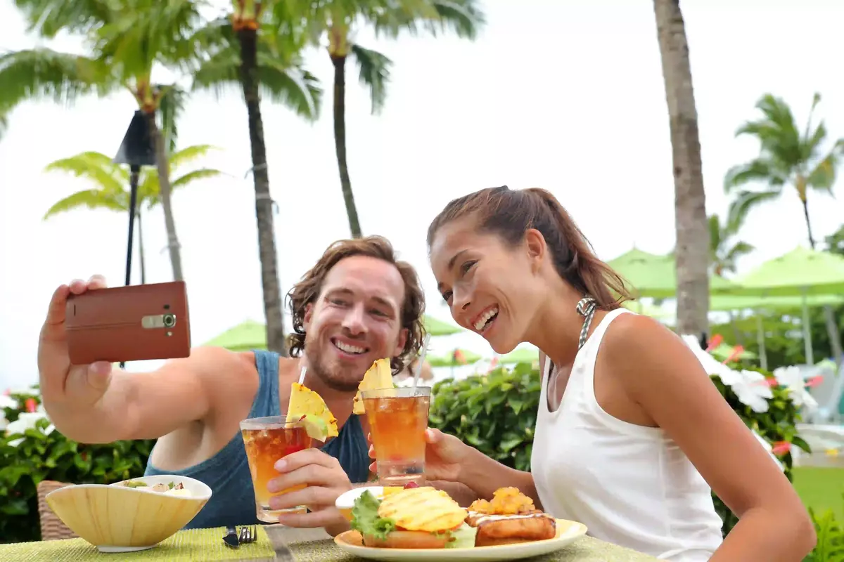 couples taking selfie in Hawaii